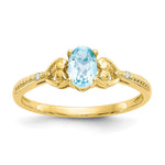 10k 6x Oval December/ Light Swiss Blue Topaz and Diamond Size 7 Ring