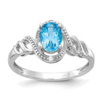 10k White Gold 7x Oval December/ Light Swiss Blue Topaz and Diamond Size 7 Ring