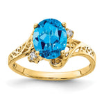 14k 9x Oval Blue Topaz and VS Diamond Ring