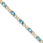 14k 7x Oval Blue Topaz bracelet
