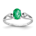 14k White Gold 7x Oval Emerald and 1/20 carat A Diamond Ring