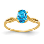 14k 7x Oval Blue Topaz Twist Ring