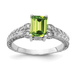 14k White Gold 7x Emerald Cut Peridot and 1/20 carat VS Diamond Ring