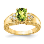 14k 8x Oval Peridot and 1/10 carat A Diamond Ring