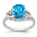 14k White Gold 10x Oval Blue Topaz and 1/15 carat AAA Diamond Ring