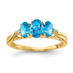 14k 6x4 / 5x Oval Blue Topaz and Diamond 3-Stone Ring