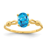 14k 7x Oval Blue Topaz ring