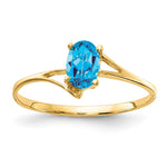 14k 6x Oval Blue Topaz ring