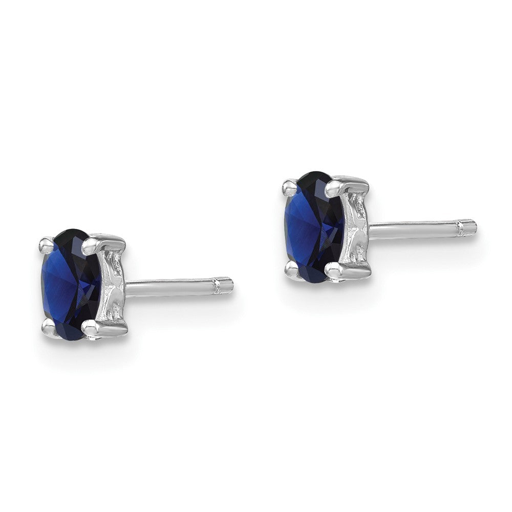 Sterling Silver Rhodium-plated 5x Oval Created Sapphire Post Earrings