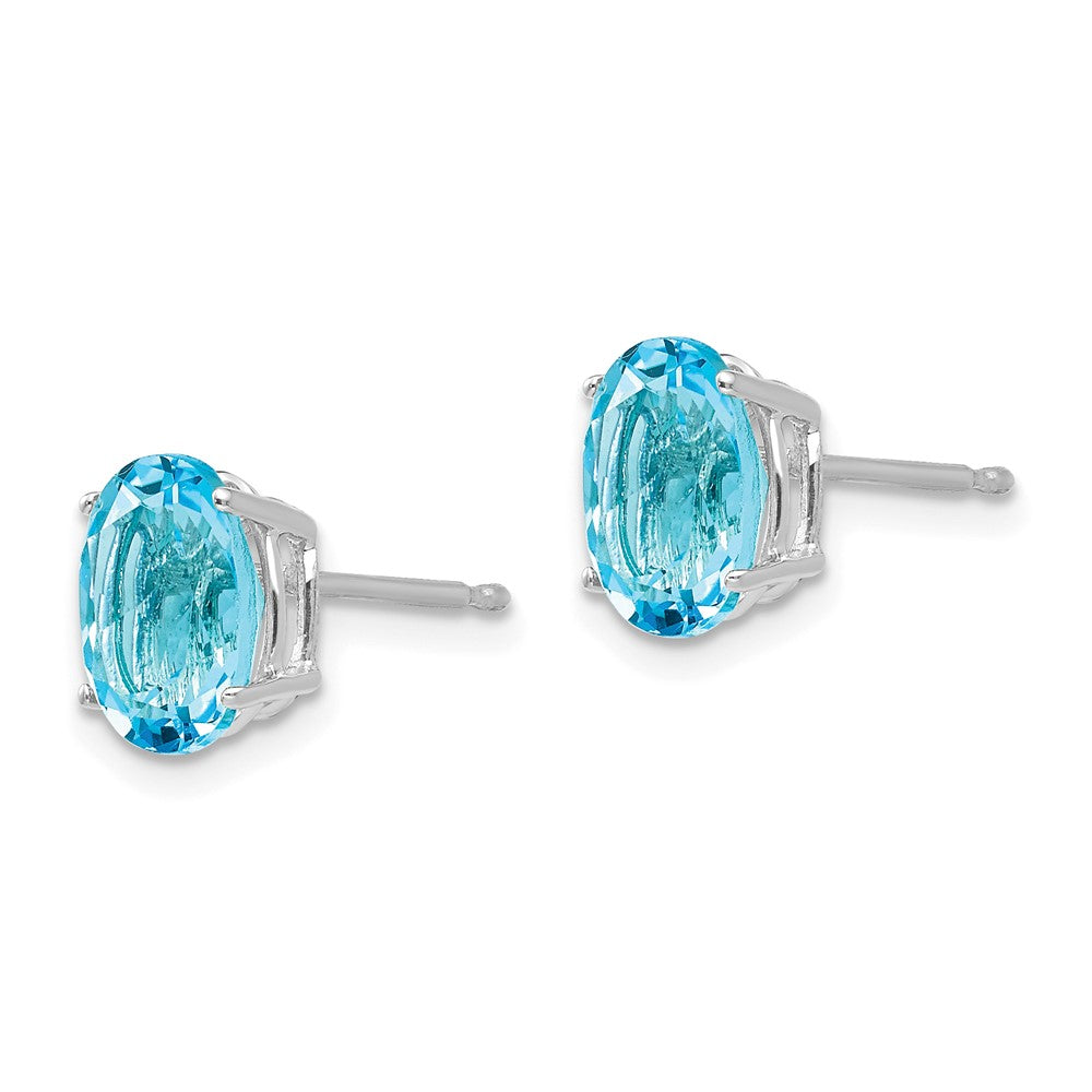 14k White Gold 8x Oval Blue Topaz Post Earrings