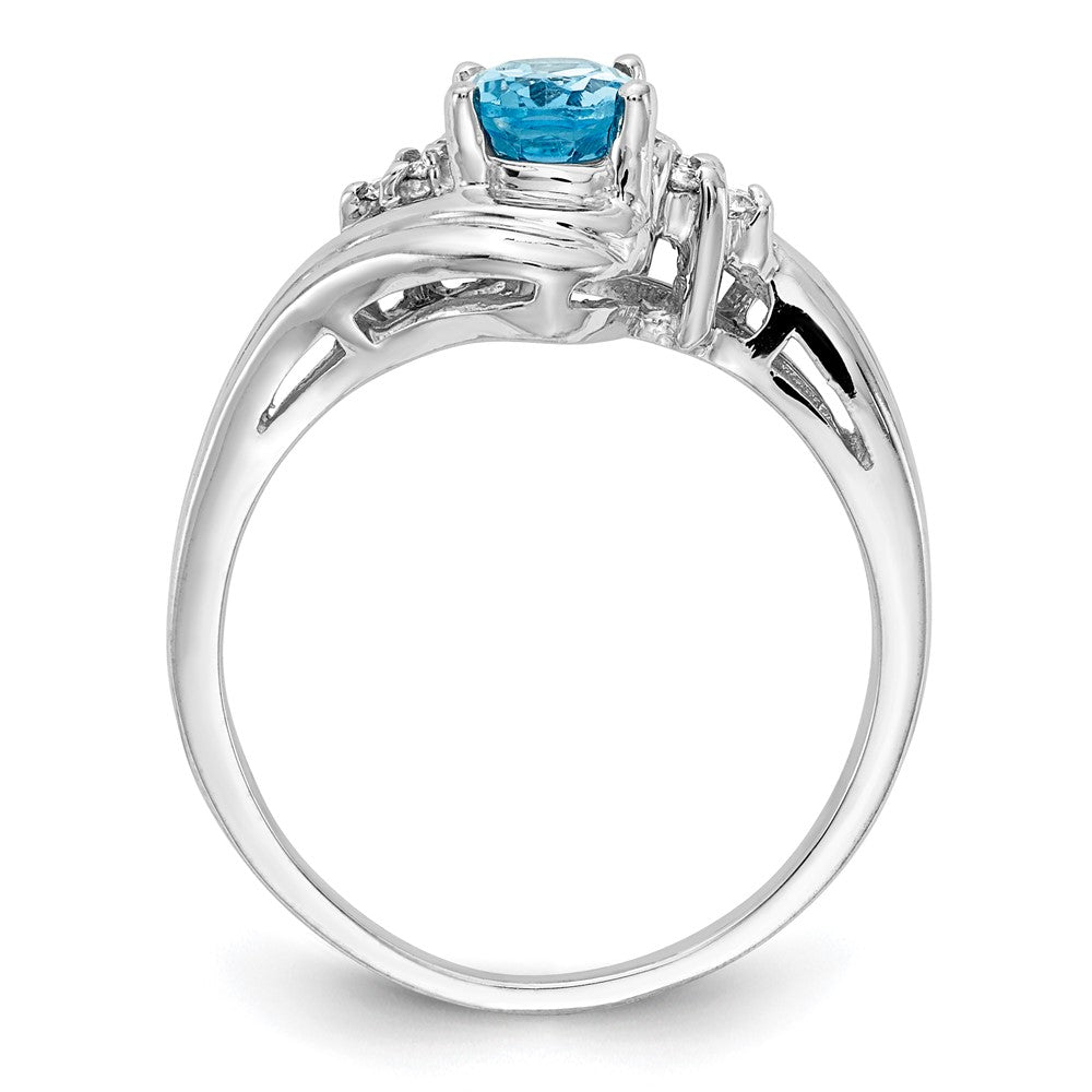 14k White Gold 7x Oval Blue Topaz and 1/15 carat VS Diamond Ring