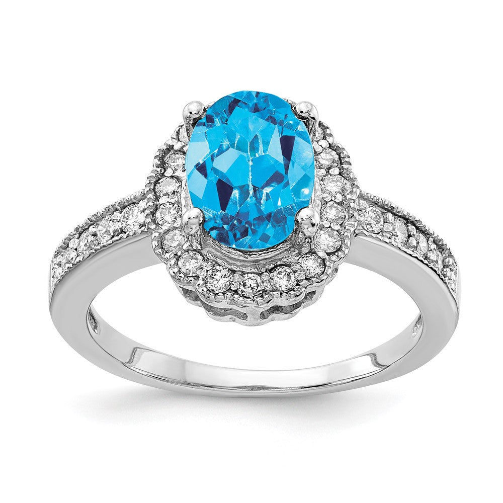 14k White Gold 8x Oval Blue Topaz and 1/3 carat VS Diamond Halo Ring
