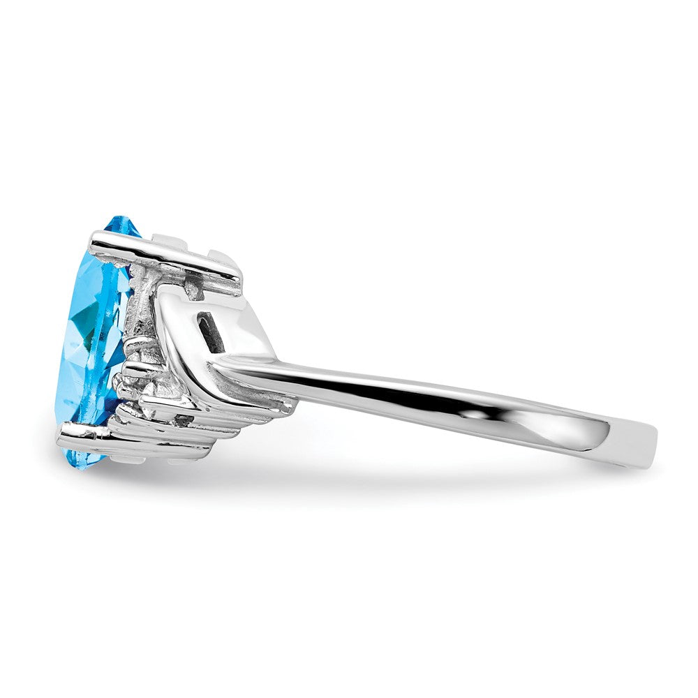 14k White Gold 10x Oval Blue Topaz and 1/15 carat VS Diamond Ring