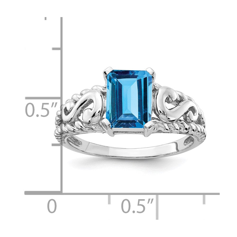 14k White Gold 8x Emerald Cut Blue Topaz ring