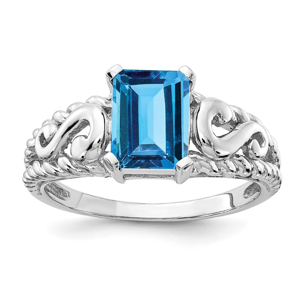 14k White Gold 8x Emerald Cut Blue Topaz ring